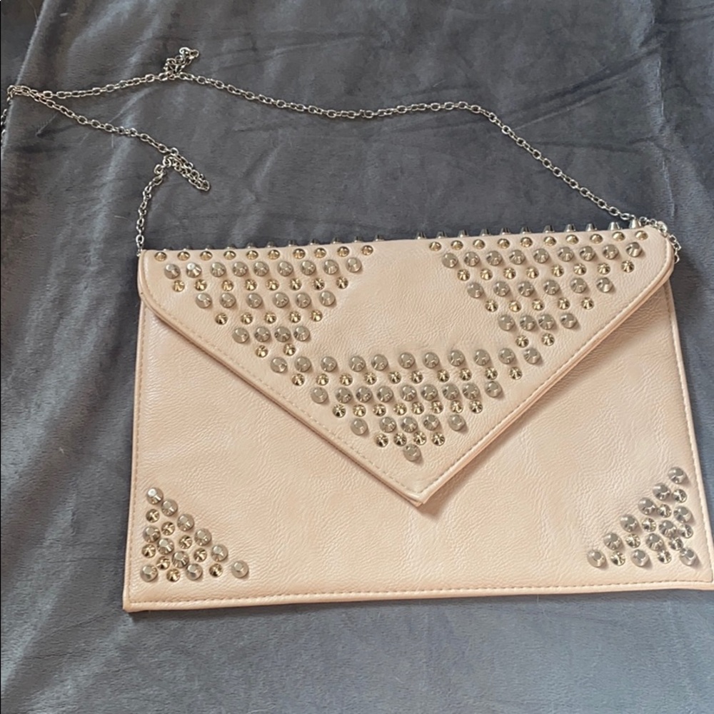 Light pink studded clutch